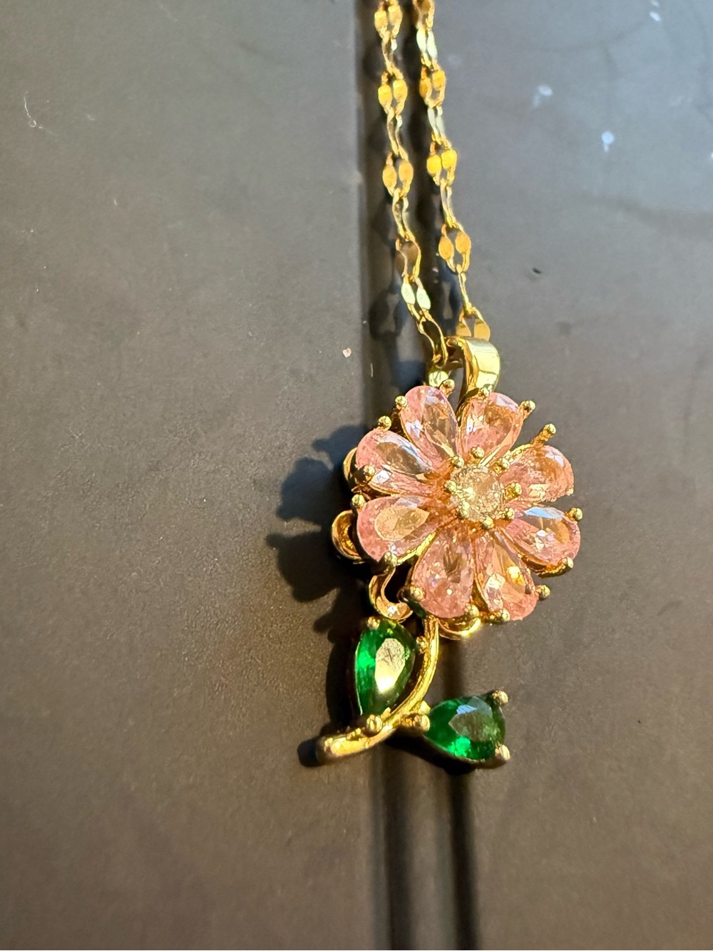 Gold Floral Pendant Necklace with Pink Crystal Flower and Green Leaves